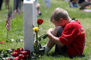 memorial day son at fathers grave